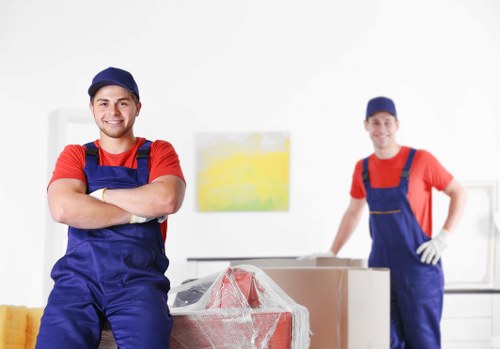 Team reviewing ethical labour compliance in a removals company setting