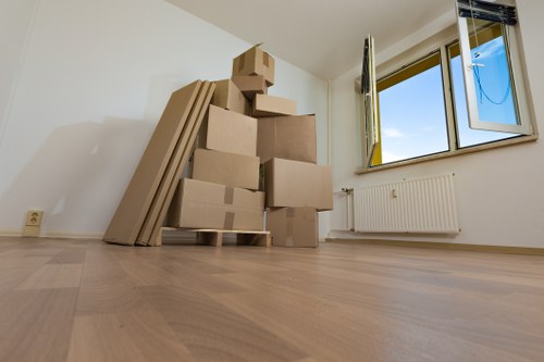 Professional movers handling packed belongings carefully