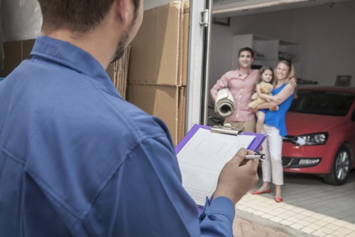 Removal van and moving boxes outside a typical Islington townhouse