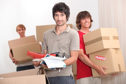 Packed office boxes and equipment ready for transport in Islington