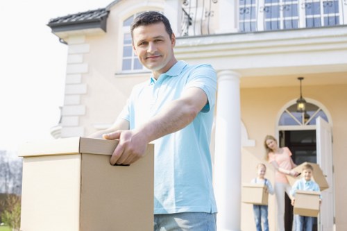 Moving boxes and household items with a hired removal truck