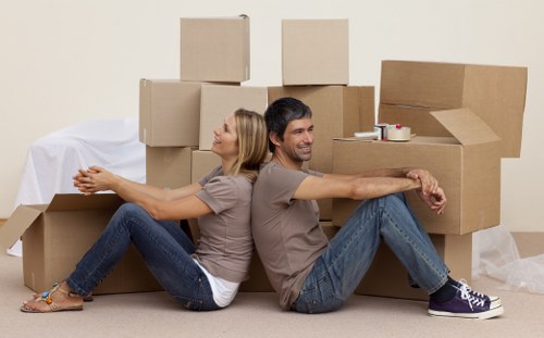 Team member following safe handling practices in a removals operation