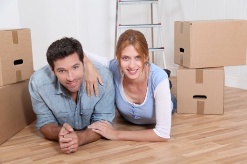 Boxes and office furniture prepared for a business move in Islington