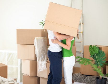 Packed belongings and furniture ready for transport during an Islington relocation