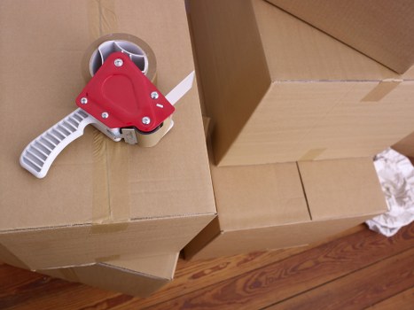 Boxes and furniture arranged for a quote-based house move