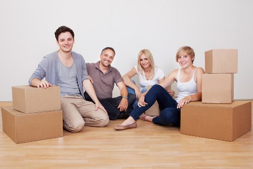 Boxes and furniture arranged for a house move in Islington