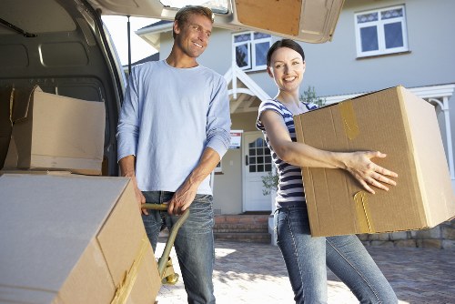 Local team collecting sofas and tables in Islington