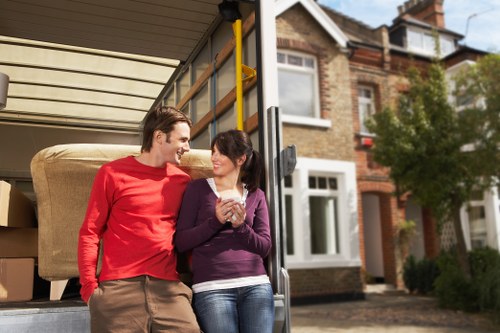 Packed moving boxes and furniture for a home removal in Islington