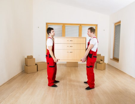 Household furniture and boxes prepared for a move in Islington